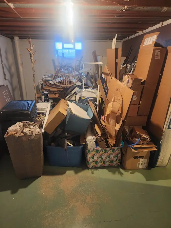 Roll-off dumpster container at job site for Yard Waste Dumpster Rental in Killingly